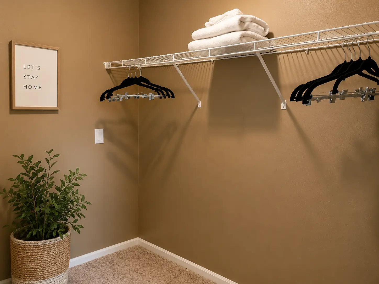 Closet with shelving and hangers